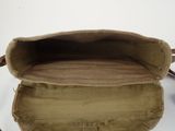 the inside of a brown bag with a zipper on it