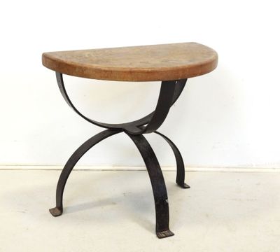 a small table with a wooden top and metal legs