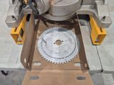 a box with a circular saw on it and a circular saw blade in it
