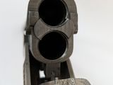 a gun that is sitting on top of a table