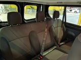 the back seats of a car with a seat belt in a parking lot