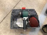 a tool box with a sander and other tools in it