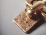 a close up of a metal padlock on a table