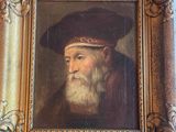 an old painting of a man with a hat and a beard