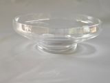 a clear glass bowl on a white table cloth
