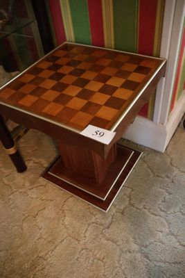 a small table with a chess board on top of it