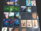 a lot of cards on the table with pictures on them