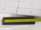 a ruler that is laying on top of a piece of paper