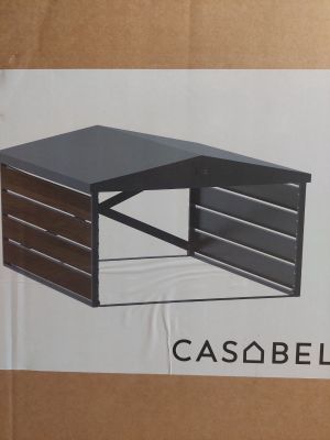 a cardboard box with a picture of a desk inside of it