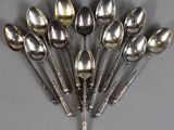 a lot of spoons that are on the table