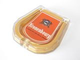 a plastic container with a piece of cheese in it