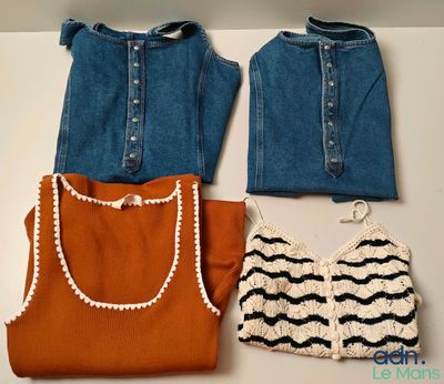 three pieces of clothing are laid out on a table