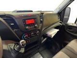 the interior of a vehicle with a radio and steering controls