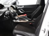 the interior of a car with a steering wheel and a dashboard