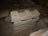 a pile of bricks sitting on top of a pile of pallets
