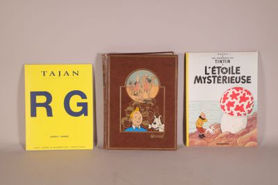 three books sitting on a table next to each other on a table