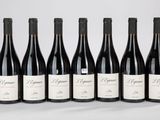 six bouteilles de vin rouge alignées