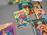 a lot of comic books on the table