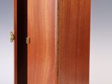 a small wooden box with a door open on a white background