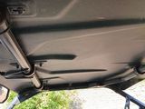 a close up of a car ' s exhaust pipe on the back of a vehicle