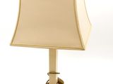 a lamp that is sitting on a table next to a lamp