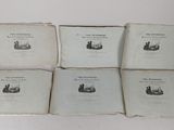 six old books sitting on top of each other on a table