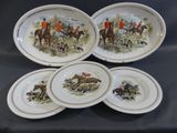 four plates with a picture of a group of people riding horses