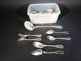 a lot of spoons and spoon spoons on the table