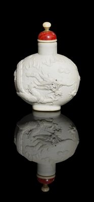 chinese white porcelain snuff bottle with red lid