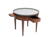 an image of a table with a marble top and drawers