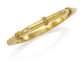 un bracelet rigide en or jaune et diamants