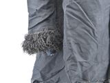 jacket on a mannequin stand with a fur collar and cuffs