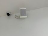 two speakers sitting on the floor next to each other