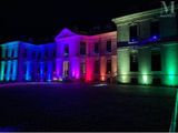 an image of a large building lit up with colorful lights