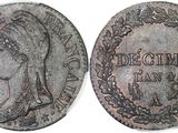 une pièce d'argent portant une tête de femme