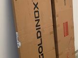a large cardboard box sitting on the floor next to a wall