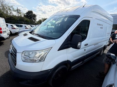 a man standing next to a white van in a parking lot