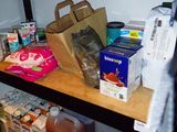a shelf with various items on it in a room