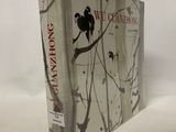 a book with a picture of a bird on a branch