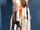 an image of a dress on a mannequin stand