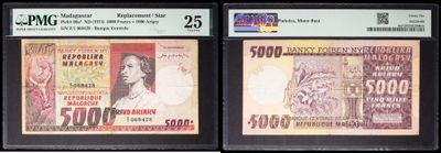 three different currency notes are on display in a display case