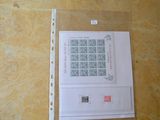 l'image d'une feuille de papier sur laquelle figurent des timbres