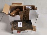 a cardboard box with a pair of scissors inside of it