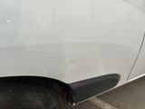 a close up of a car ' s door handle with a sticker on it