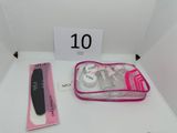 a pink case that has a pair of scissors in it