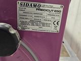 a purple machine that is sitting on a table