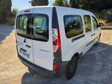 a white van that is parked in a parking lot