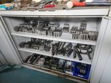many tools on the shelves in the garage