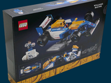 a box with a lego race car inside of it