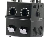 une image représentant une machine noire surmontée de quatre lumières